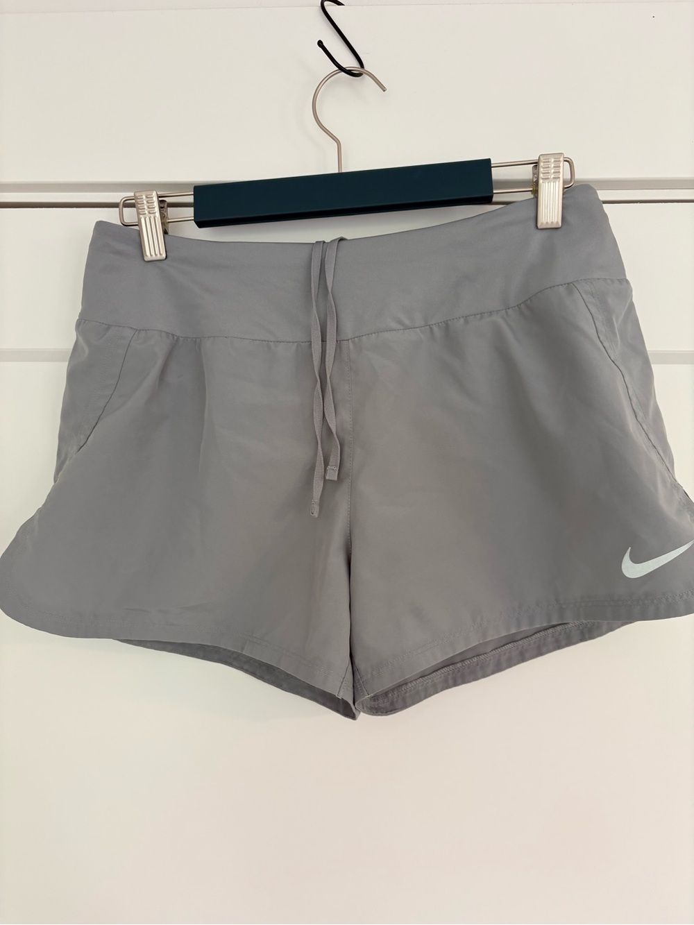 Nike Women’s Light Gray Athletic Shorts with Swoosh